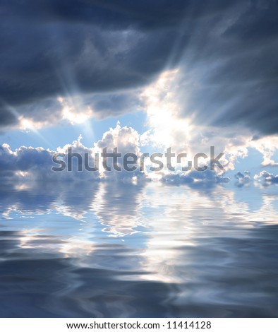 Rays of Sunshine Beaming through the Clouds Reflecting in Water