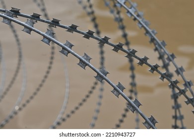 Razor Barbed Tape Wire Over Canal