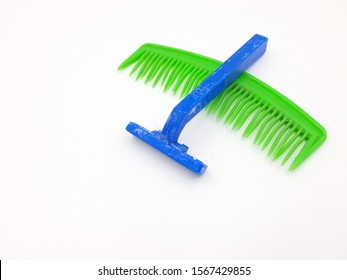 Razor and comb. Objects on white background.