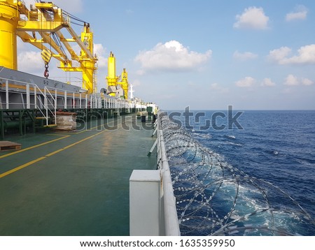 razor wire fitted on ship side during passing high risk area to prevent and avoid piracy attack.
