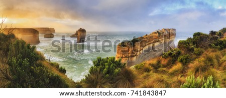 Razorblade cut off limestone rock of Great Ocean road twelve apostles marine park in Victoria. Colourful sunrise over apostles coast.