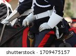 rcmp officers in military gear sitting on horses during an outdoor parade 