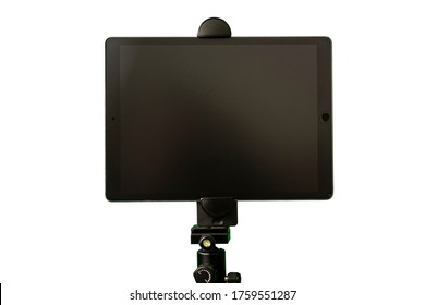 RCT, UK / June 19 2020 : Black IPad Pro Tablet Computer Mounted On A Tripod Stand.