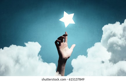Reach and touch the star . Mixed media - Shutterstock ID 615137849