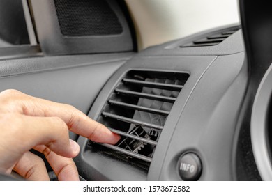 Reaching Broken Plastic Air Director By Finger In Air Conditioner (AC) Outlet Inside A Car