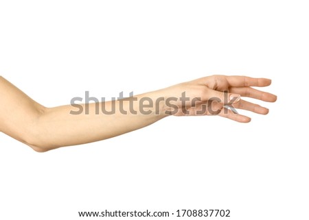 Reaching hand. Woman hand with french manicure gesturing isolated on white background. Part of series