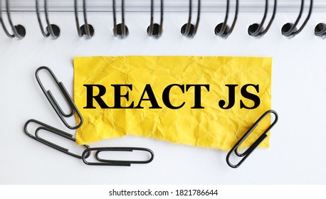 React Js. Text On White Paper On Yellow Crumpled Paper