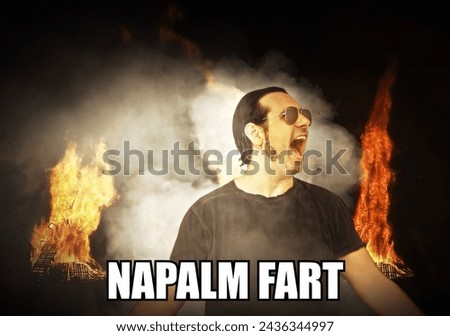 Reaction meme (internet pop culture): a tough-looking military man surrounded by burning fire and smoke clouds, cruelly smiling, with the caption Napalm Fart.

