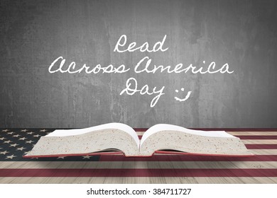 Read across america day concept with big textbook on grunge black chalkboard and USA national flag pattern on wood table - Shutterstock ID 384711727