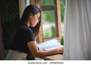 read a book by the window