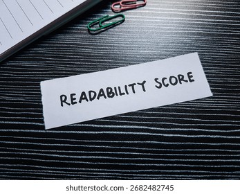 Readability scoring writting on table background.