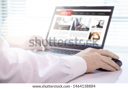 Reader, journalist or writer with online news article on laptop screen. Digital media portal mockup. Latest daily press. Editor writing or person using electronic newspaper or web magazine service.