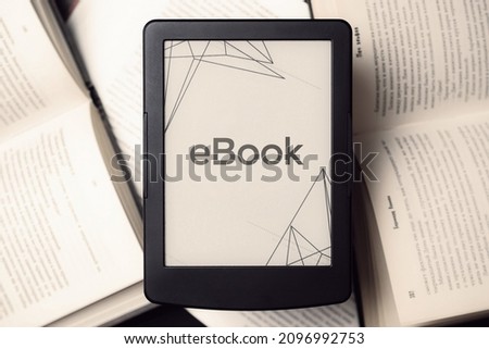 Readers. Digital e book, library reader tablet with books on dark background. Ebook, e learning electronic internet mobility concept