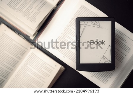 Readers. Digital e book, library reader tablet with books on dark background. Ebook, e learning electronic internet mobility concept