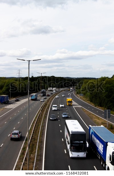 Reading, Berkshire, England -\
August 30, 2018: M4 motorway at junction 12, road run between\
London and Wales and is the busiest in Europe and known as the m4\
corridor