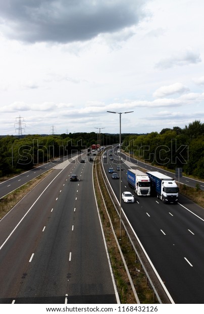 Reading, Berkshire, England -\
August 30, 2018: M4 motorway at junction 12, road run between\
London and Wales and is the busiest in Europe and known as the m4\
corridor