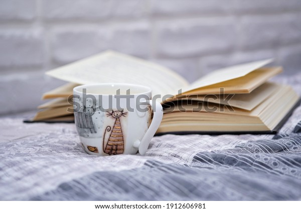 Reading a book\
and drinking coffee in your spare time. Spending time alone at home\
with literature. Resting in\
peace