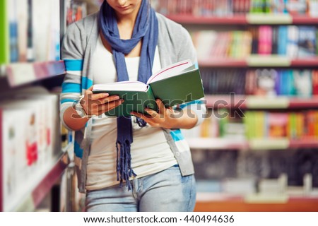 Reading book in library