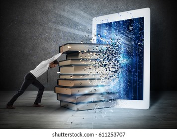 Reading books with an E-book - Shutterstock ID 611253707