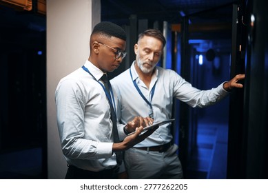 Reading, engineer or people with tablet in server room, system backup process or cybersecurity update. Review, firewall testing and team with mainframe maintenance, tech and data center inspection