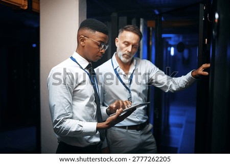 Reading, engineer or people with tablet in server room, system backup process or cybersecurity update. Review, firewall testing and team with mainframe maintenance, tech and data center inspection