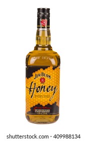 READING MOLDOVA APRIL 7, 2016. Photo of a bottle of Jim Beam Honey. Jim Beam is an American brand of bourbon whiskey produced in Clermont, Kentucky.