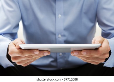 Reading News At Digital Tablet