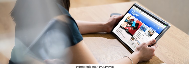 Reading Newspaper Article On Tablet. News Media - Shutterstock ID 1921198988