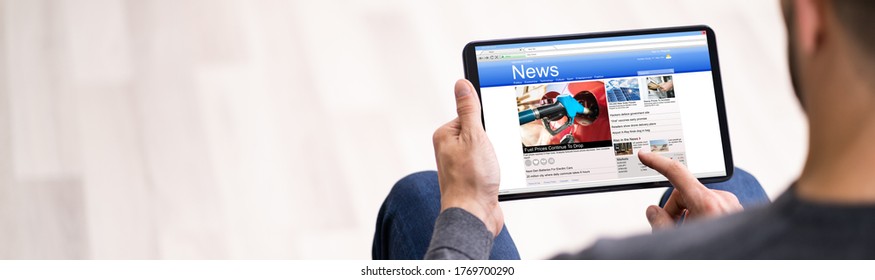 Reading Newspaper Article Online On Digital Tablet