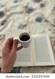 Reading in process,book and coffee