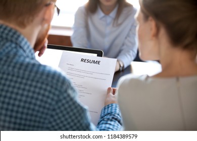 Reading Resume At Job Interview Concept, Hr Employer Holding Cv Examining Skills And Experience Of Vacancy Position Candidate Making First Impression, Employment And Hiring, Staff Recruiting Concept