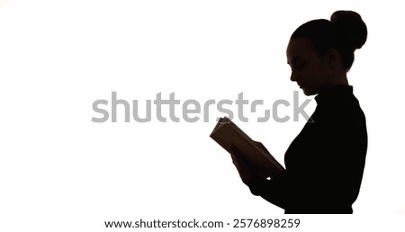 Reading silhouette. Knowledge study. Learning education. Dark contrast profile outline of smart woman with book isolated on white copy space background.