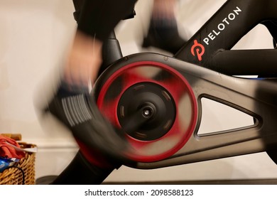 READING, UK - DECEMBER 25, 2021: Feet Pedalling On A Peloton Bike In Reading, Berkshire, UK.