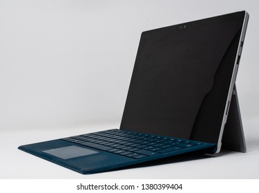 Reading, United Kingdom - April 19 2019:   A Side On View Of A Microsoft Surface Pro 4 Tablet Laptop Hybrid