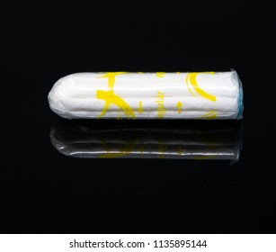 Reading, United Kingdom - July 08 2018:   A Tampon Still In It's Plastic Wrapper