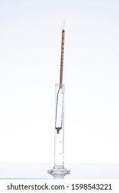 Reading the value from a hydrometer. Used for determining the specific gravity of liquids including beer. 