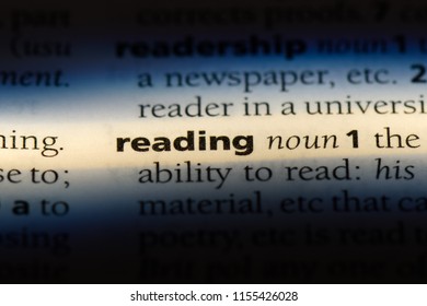 reading word in a dictionary. reading concept. - Shutterstock ID 1155426028