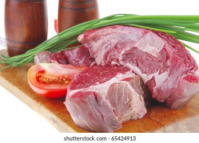 ready to cook: raw beef fillet mignon on cutting board prepared for roasting - Powered by Shutterstock