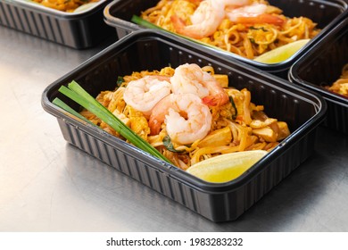 Ready to eat asian rice box, Thai food in take away plastic boxes, Pad Thai Noodles.