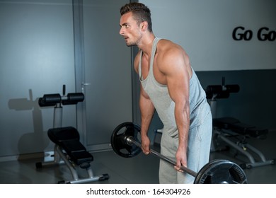 Ready To Lift. Man Performing Heavy Deadlift In A Gym