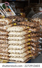 Ready packed various type of nuts at Arked Niaga, Padang Besar in selective focus and blurry.
