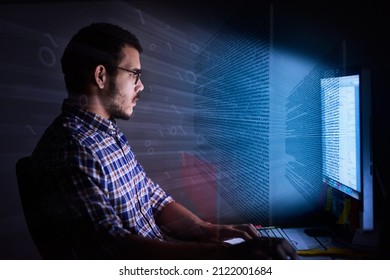 Ready, set, code. Cropped shot of a young computer programmer looking through data. - Shutterstock ID 2122001684