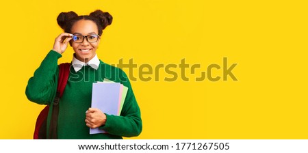 Similar – Image, Stock Photo Cheerful African American teenagers in denim outfits