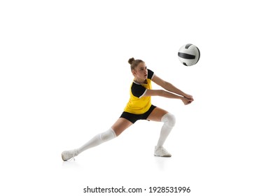 Ready. Young female volleyball player isolated on white studio background. Woman in sportswear training and practicing in action, flight. Concept of sport, healthy lifestyle, motion and movement.