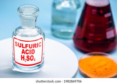 Reagent Bottle With Description: Sulfuric Acid. A Mineral Acid Composed Of The Elements Sulfur, Oxygen And Hydrogen With The Molecular Formula H₂SO₄