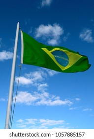 Real Brazilian Flag Waving In The Sun, Brazil 