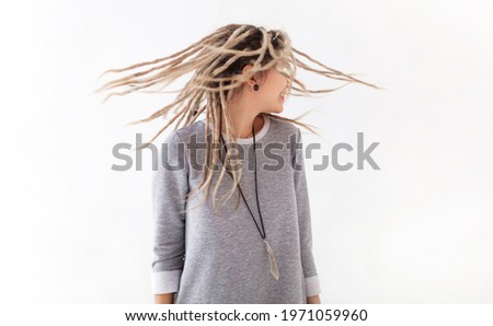 Real caucasian woman with dreadlocks hairstyle funny cute cheerful face