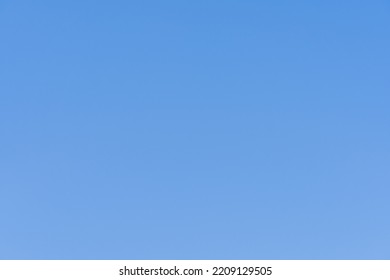 Real clear blue sky without clouds background at mid latitudes 10-12 noon - Shutterstock ID 2209129505