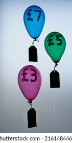 Real Coloured Blown Up Balloon With Sterling Sign And Pounds Number Symbolising Rising  Prices The Increasing Cost Of Living. Concept Or Metaphor For Inflation Flying High