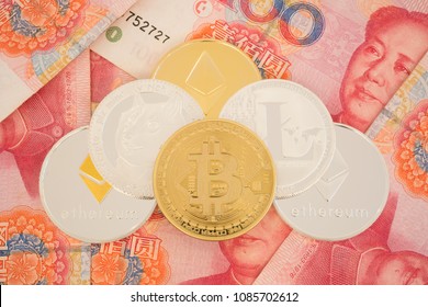 Real Cryptocurrency Coins On Chinese Yuan Bills - Crypto Currency In China Concept